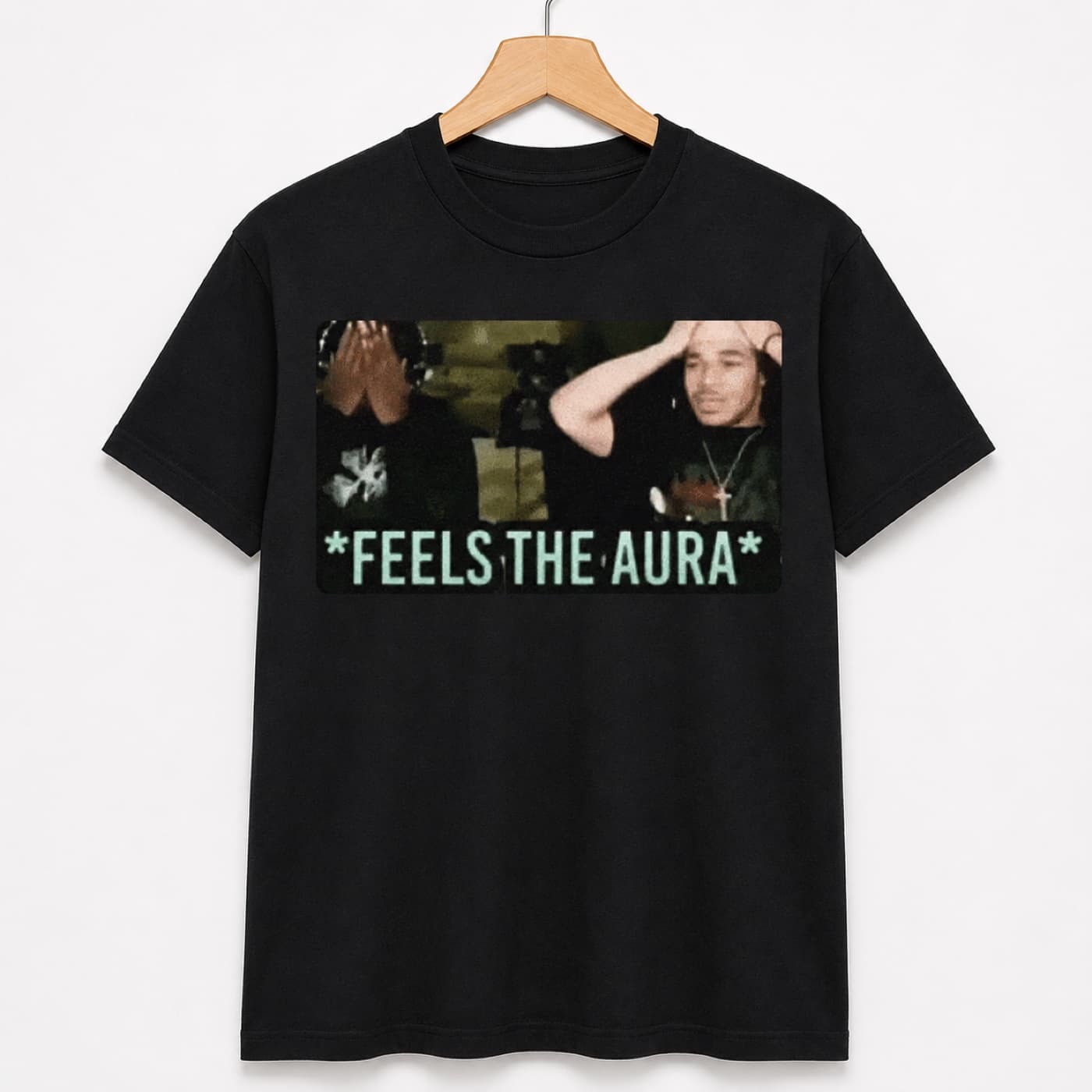 Feels The Aura t-shirt on a hanger
